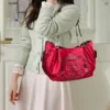 Damen-Handtasche aus Wildlederimitat mit Buchstabendruck, Retro-Einkaufstasche mit großem Fassungsvermögen für den täglichen Pendelverkehr und zum Tragen von Hand. Kürbistasche 6