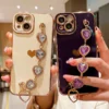 Luxuriöse vergoldete Diamant-Armband-Ketten-Handyhülle für iPhone 11, 12, 13, 14, 15, 16 Pro Max, X, XR, XS, süßer Rahmen auf 7, 8 Plus-Armband-Abdeckung