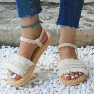 Damenmode-Trend-Schnürsenkel mit Quasten sind rutschfeste, verschleißfeste, bequeme Sandalen mit weicher Sohle und flachem Absatz
