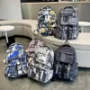 Neuer modischer Schulrucksack für Jungen im Teenageralter, coole Schultasche, wasserdichter Reiserucksack, große College-Büchertasche, Kinderschultaschen 2