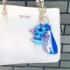 Stitch Surf Schlüsselanhänger – Schlüsselanhänger im hawaiianischen Strandstil, Disney-Sommerurlaubszubehör für Schwimmtaschen und Handtücher, Halloween-Geschenke 2