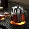 Hitzebeständige Glas-Teekanne mit Teesieb aus Edelstahl, Blumenkessel, Kung-Fu-Teegeschirr-Set, Puer-Oolong-Topf 1