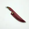 Ein Küchenmesser mit feststehender Klinge, ausgestattet mit einer Messerscheide und einer gebogenen Klinge zum Schlachten und Entbeinen. 3